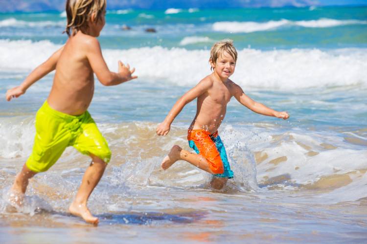 kids playing on beach